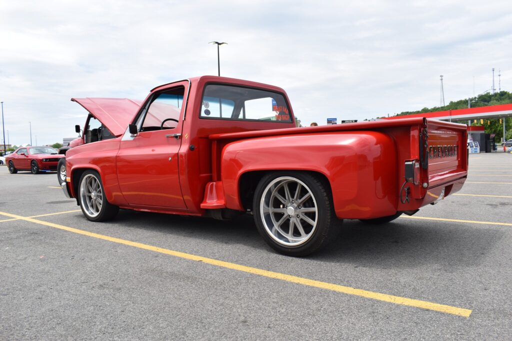 red chevy truck at cars and coffee bridgeport